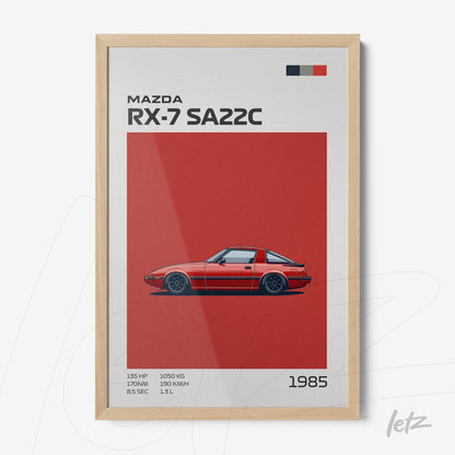 framed wall art featuring an illustration of the Mazda RX-7 SA22C on a red background with a light wood frame
