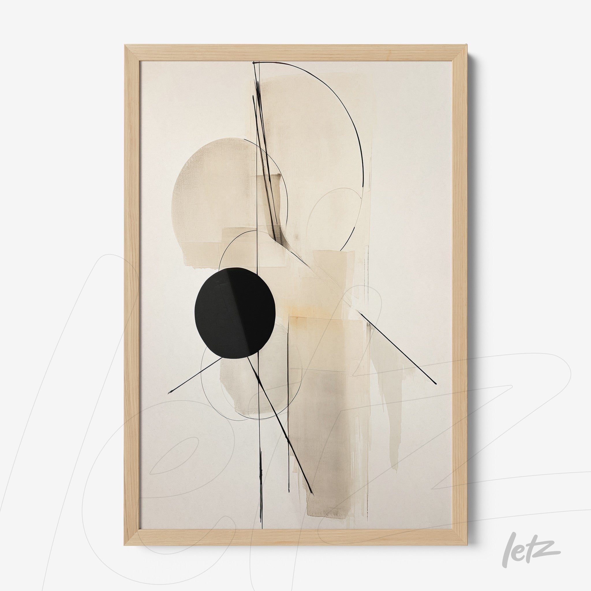 framed abstract wall art in neutral tones and black with light wood frame