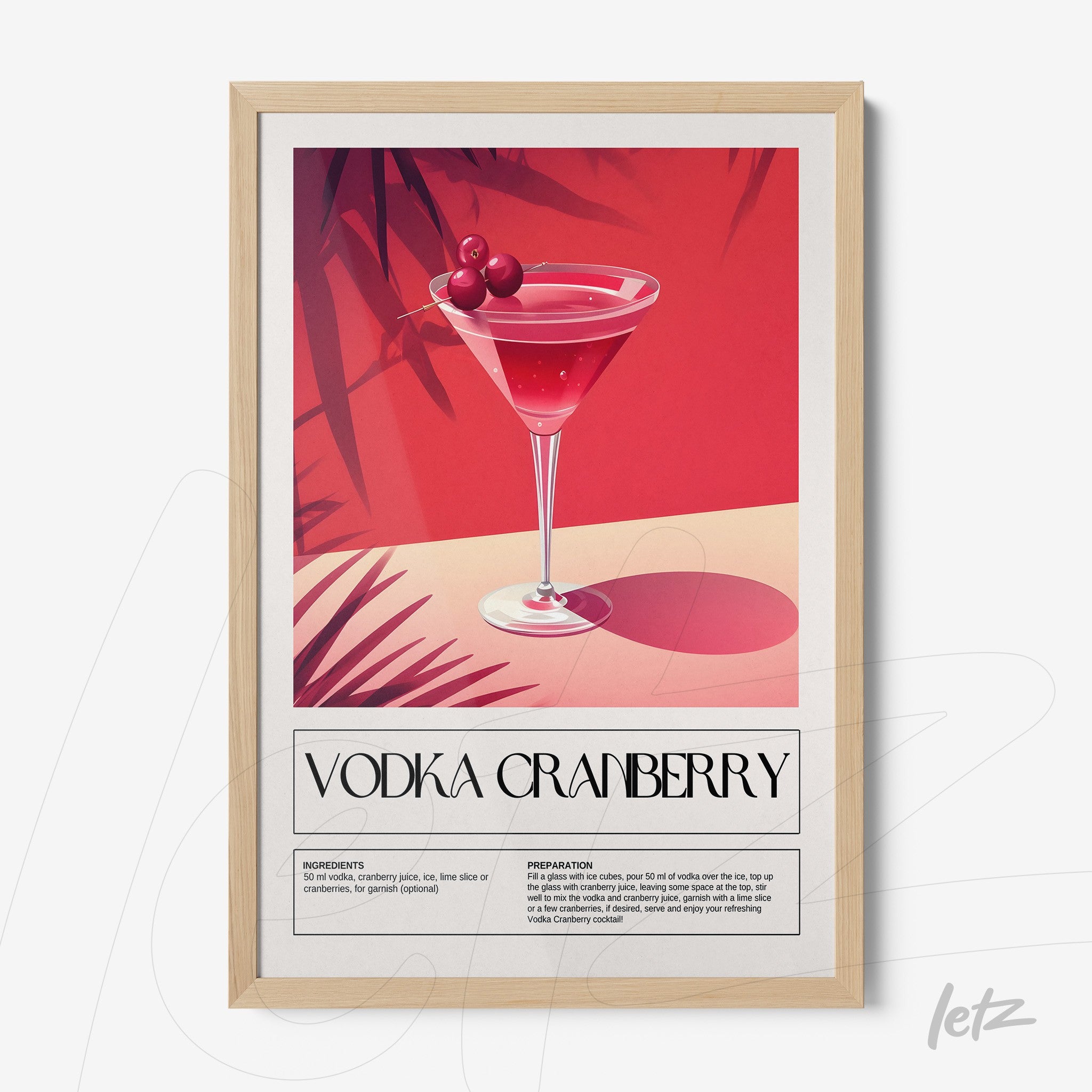 framed wall art featuring a graphic illustration of a vodka cranberry cocktail with light wood frame
