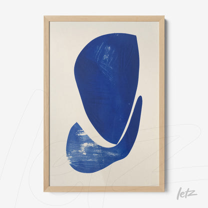 abstract wall art in blue with light wood frame
