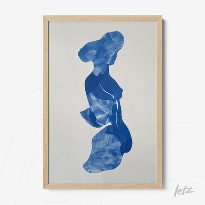 framed artwork featuring an abstract blue silhouette of a female figure on a light background with a light wood frame