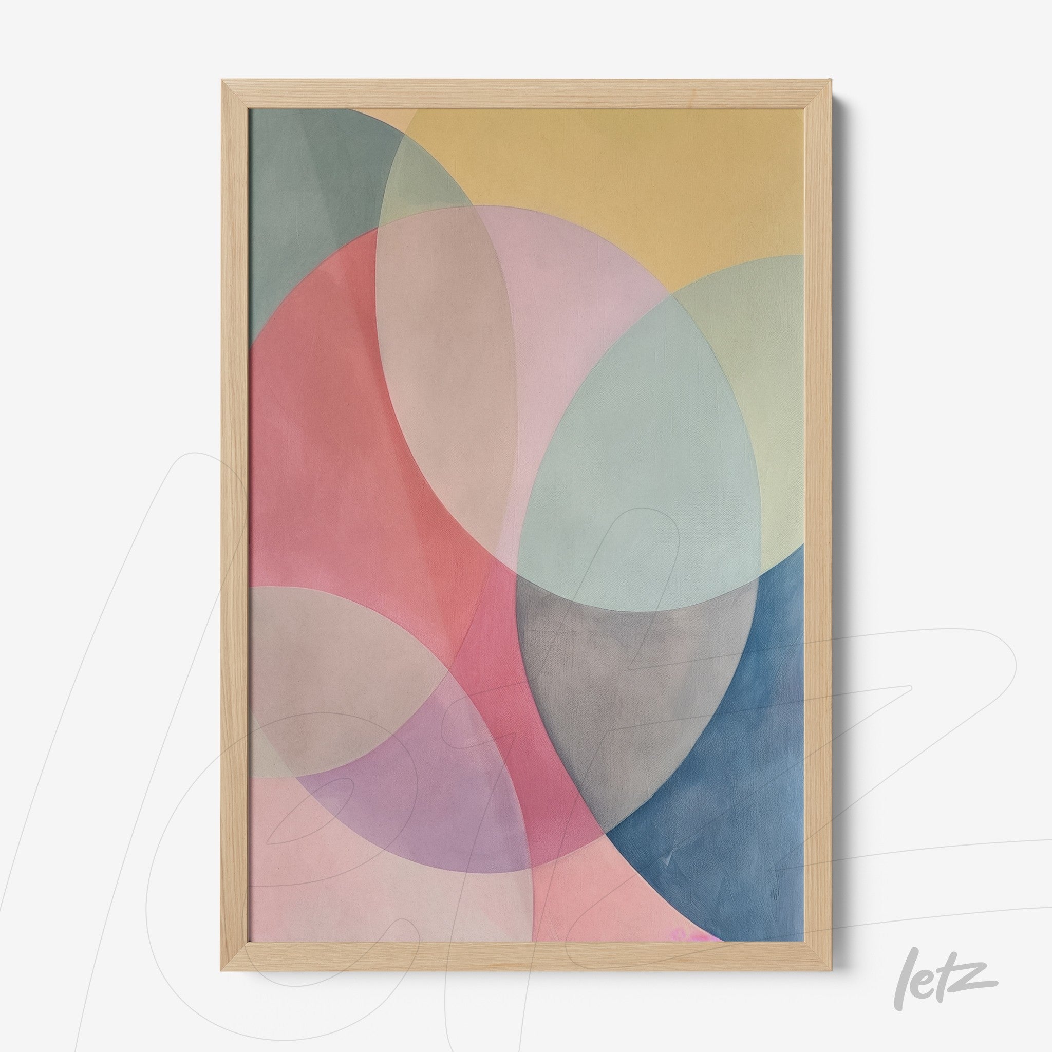 abstract wall art featuring circular shapes in shades of pink, blue, and yellow with a light wood frame