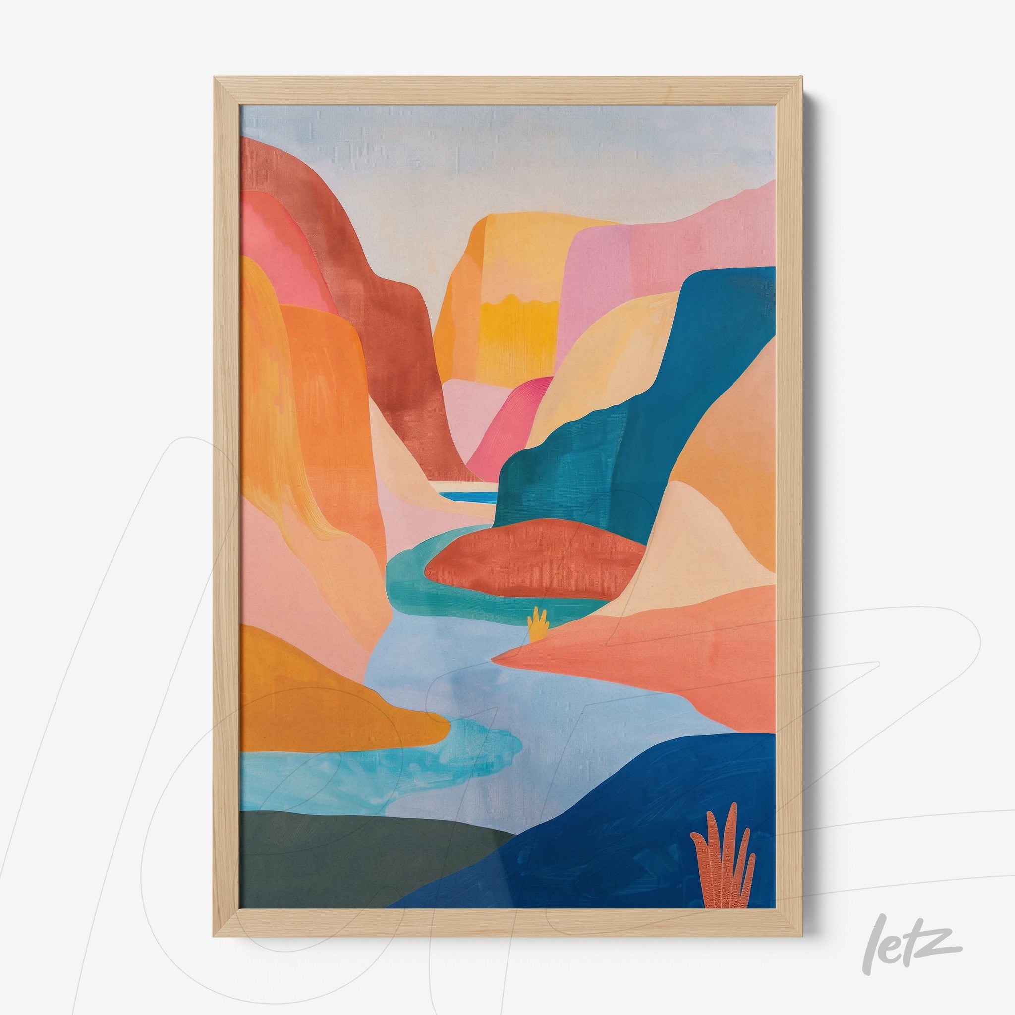 framed abstract art of a canyon in warm tones with light wood frame