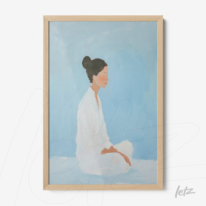 framed art featuring a minimalist portrait of a woman meditating against a light blue background with a light wood frame