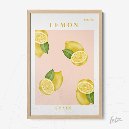framed wall art featuring lemons on a pink background with light wood frame