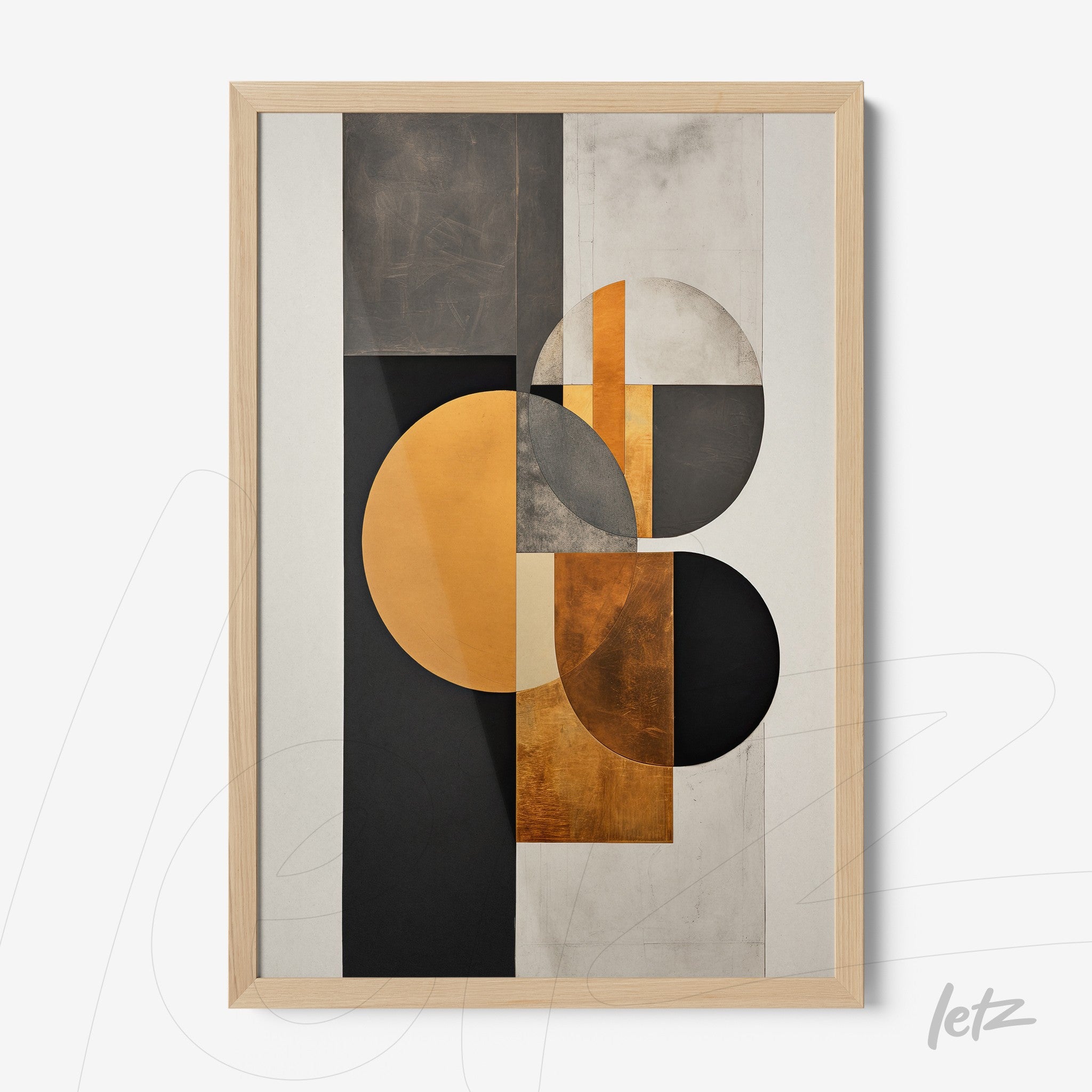 framed wall art featuring abstract geometric shapes in black, gray, and gold with a light wood frame
