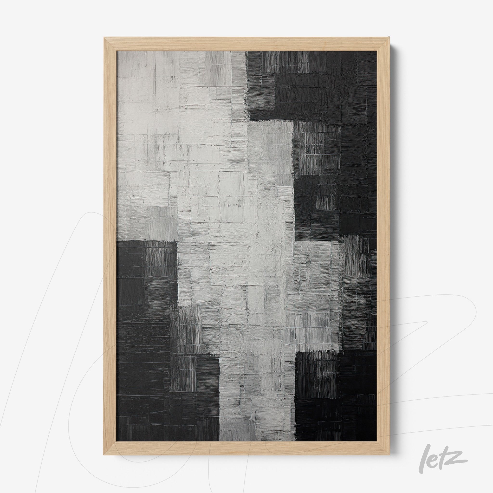 abstract wall art in black and white with striking texture in light wood frame