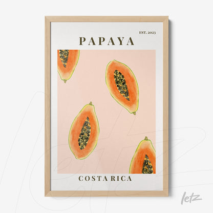 framed wall art featuring papaya illustration on light pink background with light wood frame