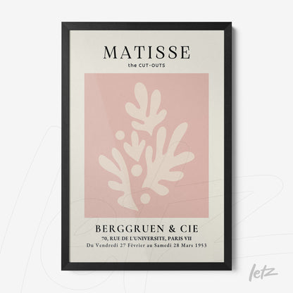 framed artwork featuring stylized shapes on light pink background with black frame