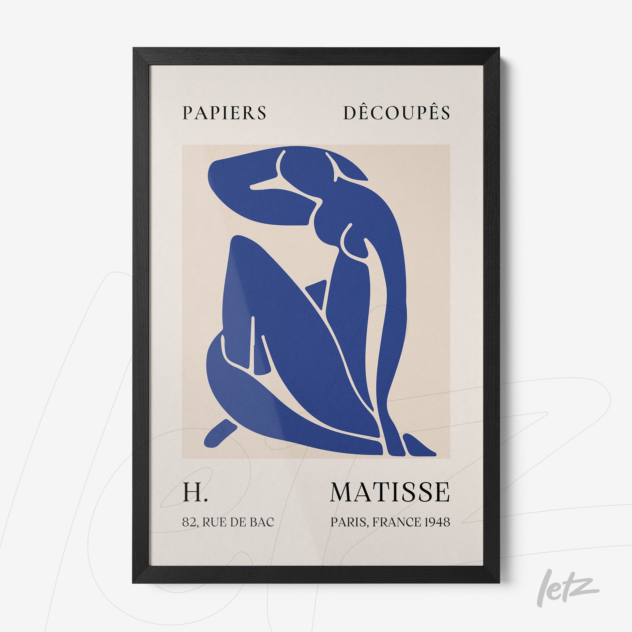 framed modern art depicting a female figure in blue, thin black frame, light background with stylized text