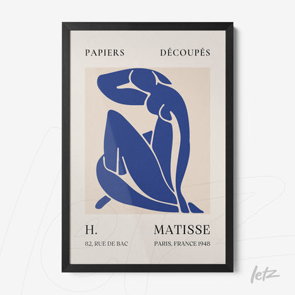 framed modern art depicting a female figure in blue, thin black frame, light background with stylized text