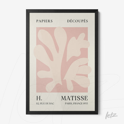 framed wall art featuring abstract shapes in pink and white with black lettering