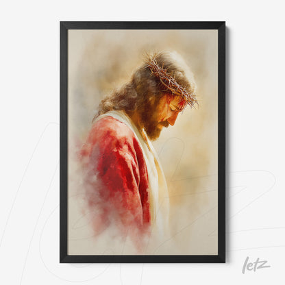 framed artwork of jesus christ in black frame with a soft warm toned background