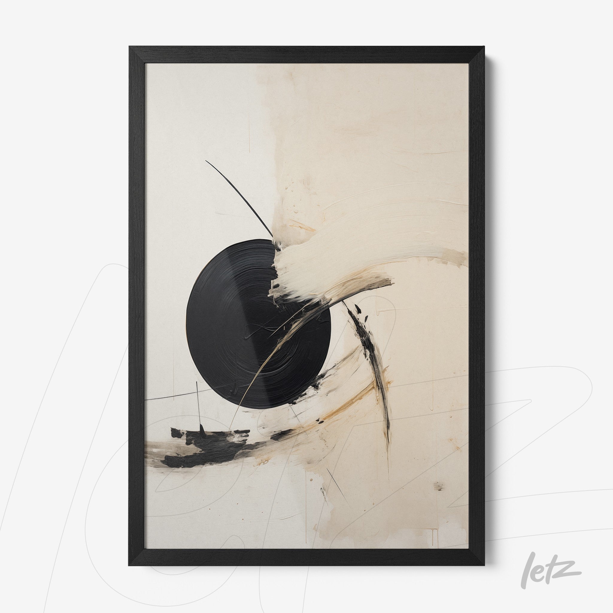 abstract wall art in beige and black tones featuring a prominent circular design in a black frame