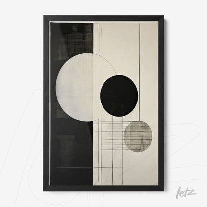 abstract framed wall art with geometric shapes in black, gray, and white