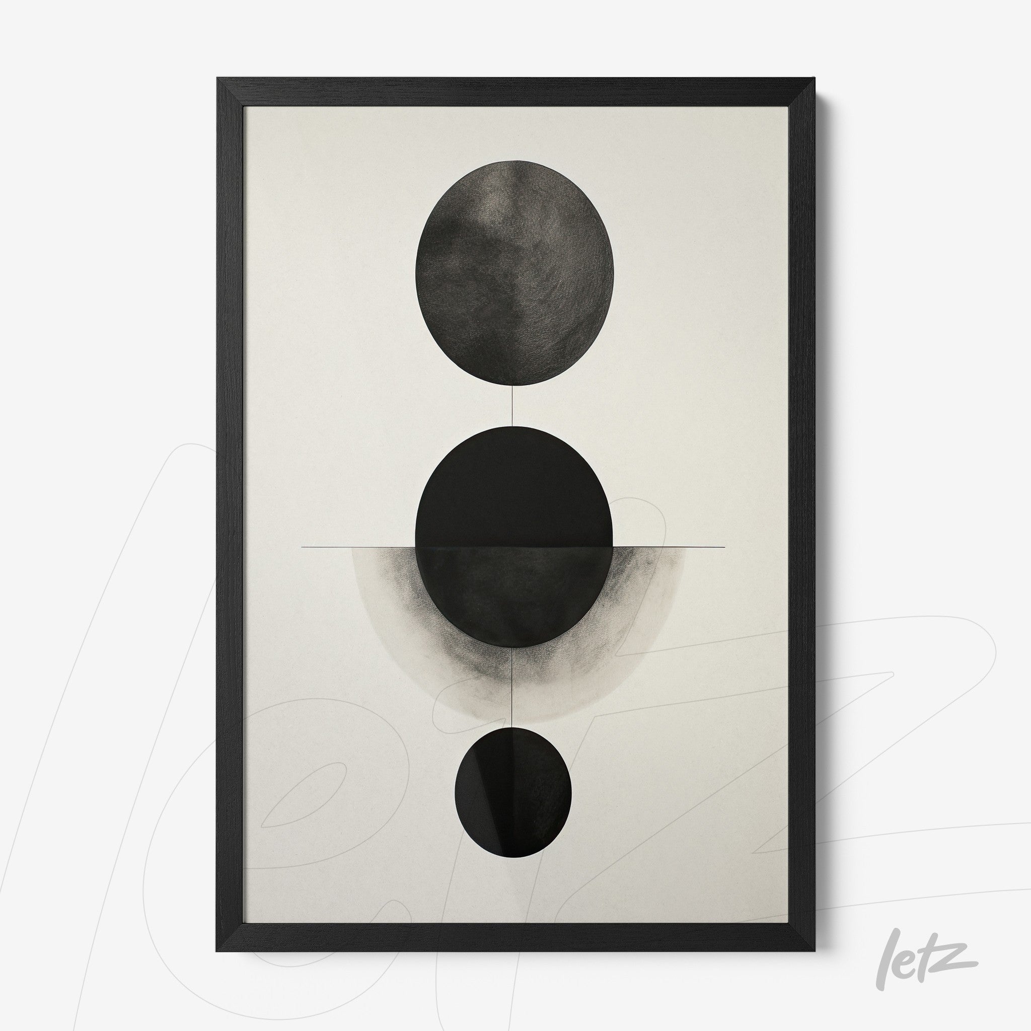 framed abstract wall art in black and white featuring circles on a light background with black frame