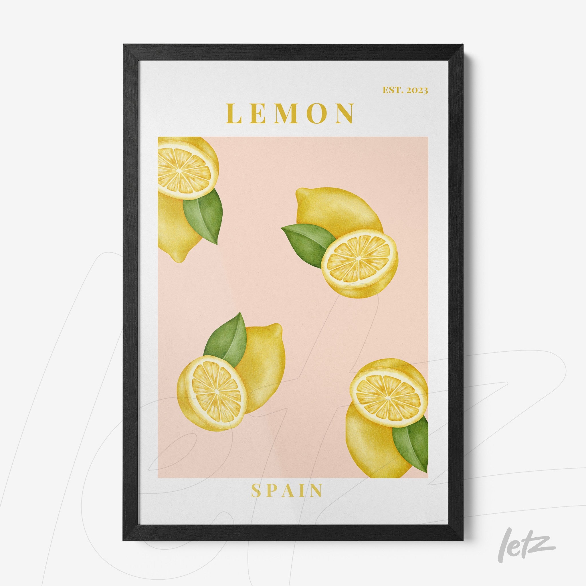 framed artwork featuring sliced and whole lemons on a pink background with a black frame