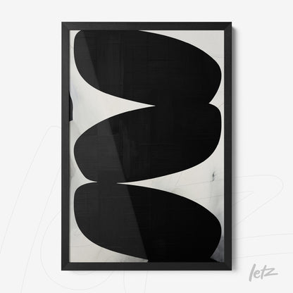 framed modern art piece in black and white featuring curved shapes and black frame
