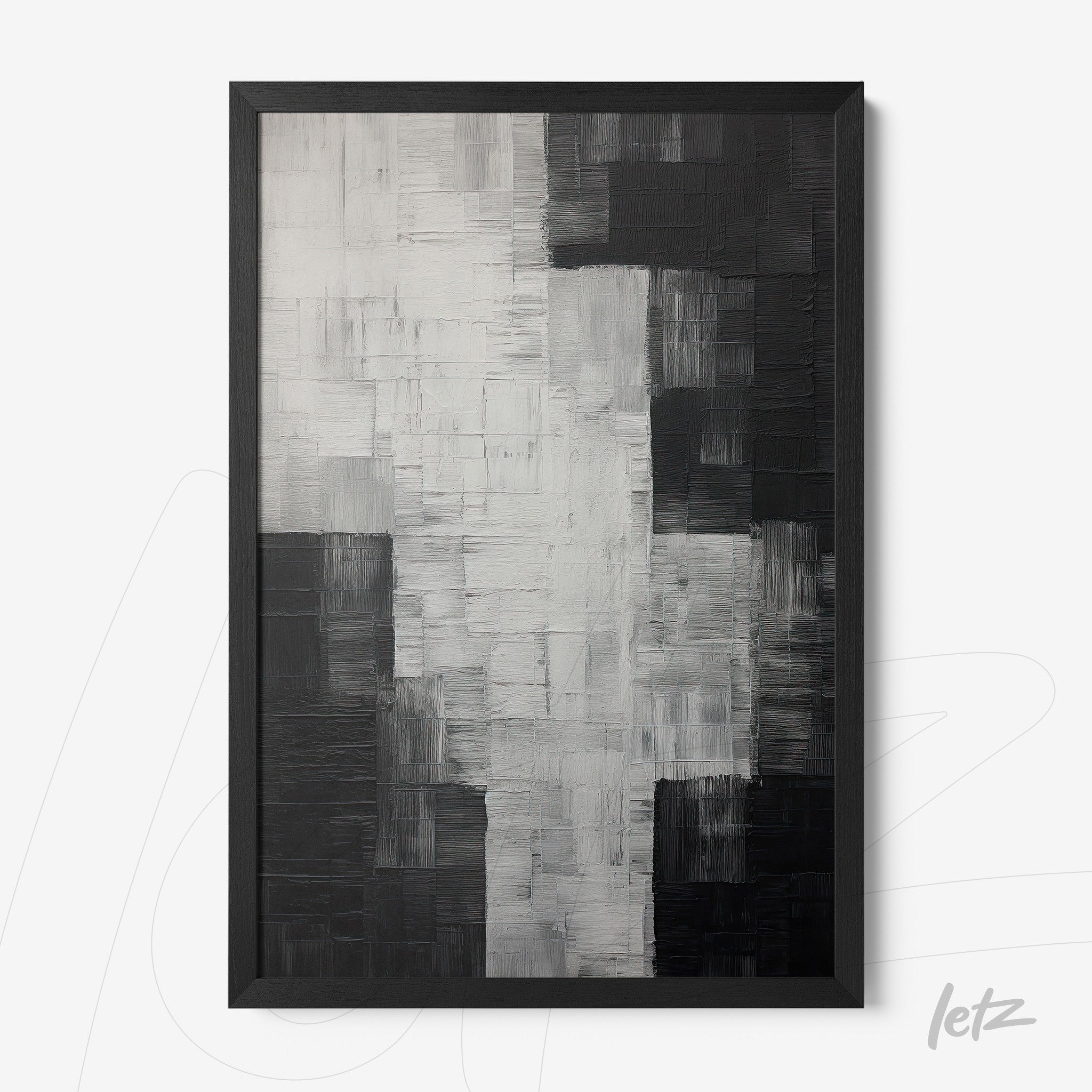abstract wall art in black, white, and gray with textured brush strokes and black frame