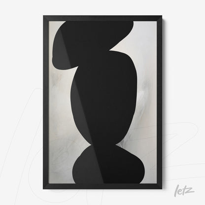 abstract wall art in black and white within a thin black frame
