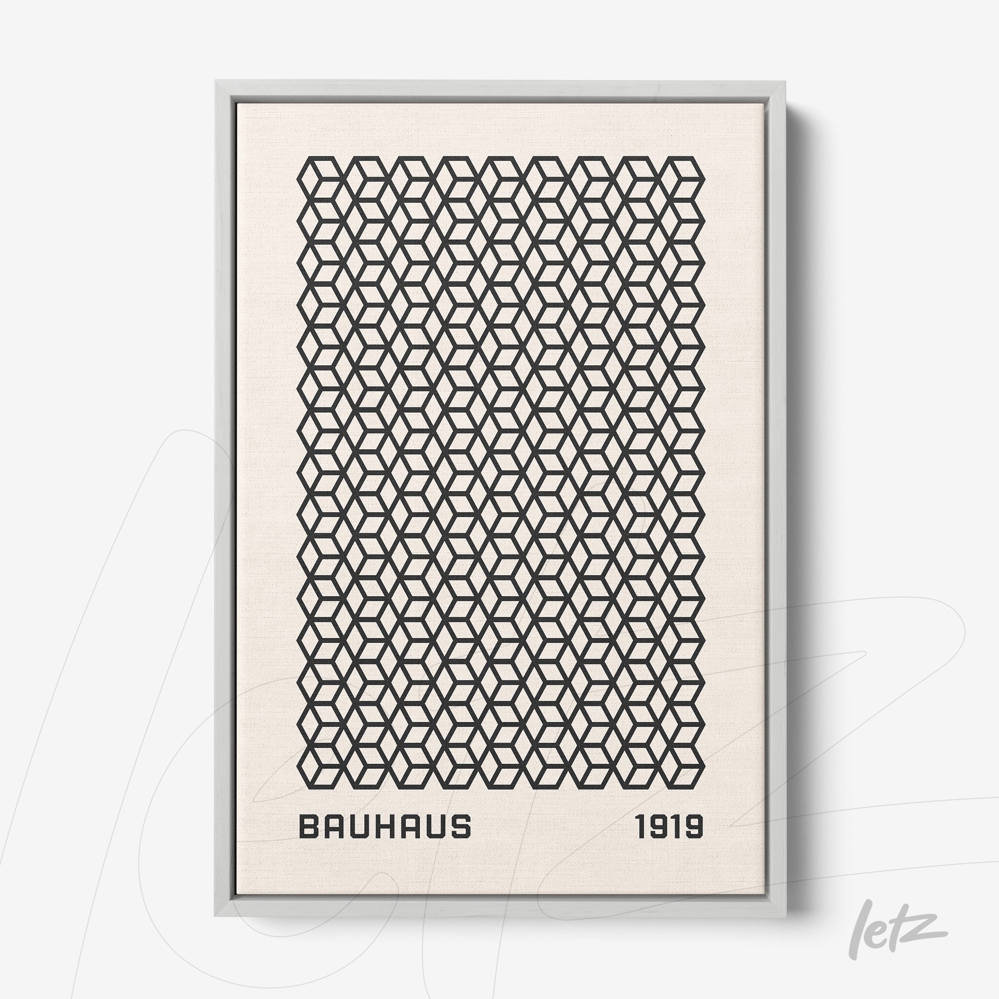 poster print with black geometric pattern on beige background in thin gray frame, text 'Bauhaus 1919' at the bottom