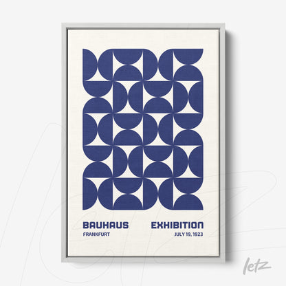 poster with blue geometric illustration in silver frame