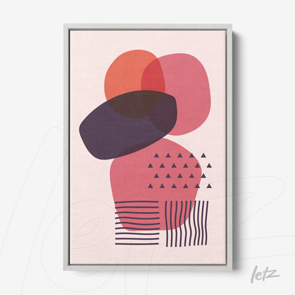 framed abstract art with overlapping geometric shapes in shades of pink and red, light gray frame