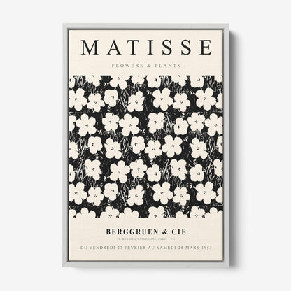 framed art inspired by matisse featuring white flowers on a black background with silver frame