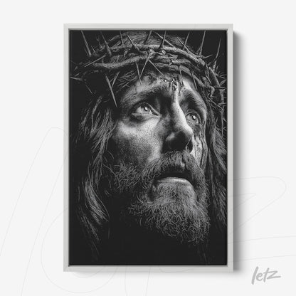 black and white framed artwork featuring a detailed portrait of Jesus Christ with a white frame and dark background