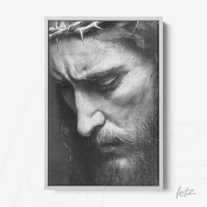 black and white framed portrait of a man with a contemplative expression and a crown of thorns