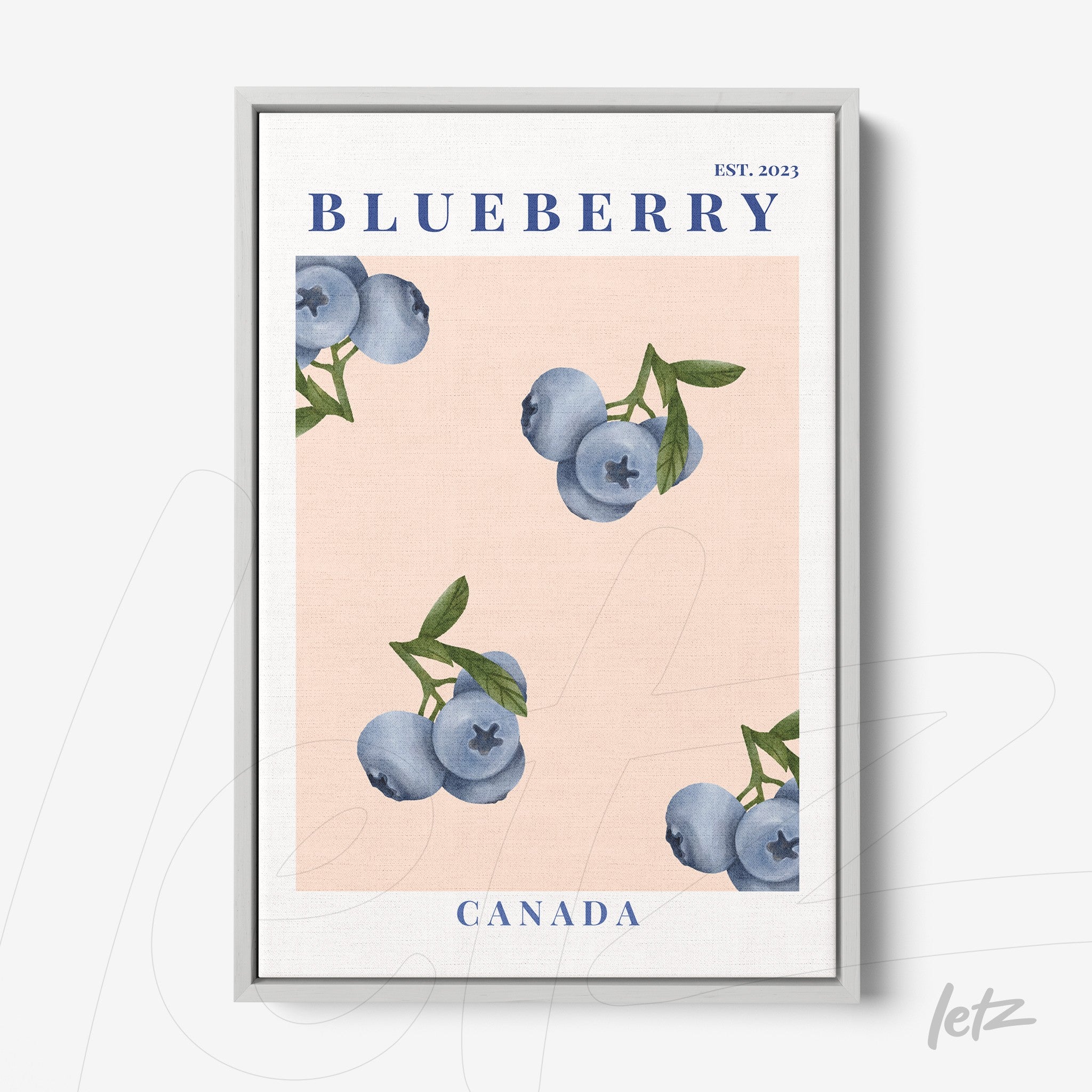 framed art of blueberries on light pink background with silver frame