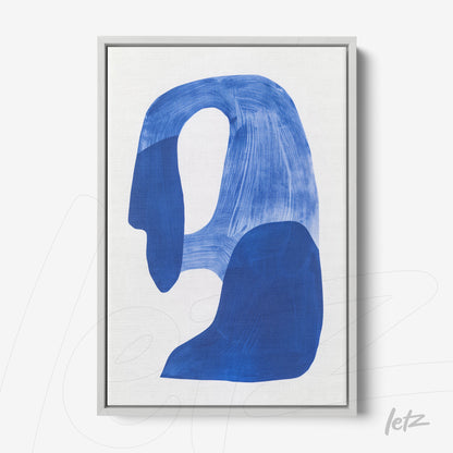 modern framed wall art featuring abstract design in shades of blue on white background with silver frame