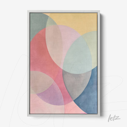 framed abstract art in pastel colors featuring circular shapes on a soft background
