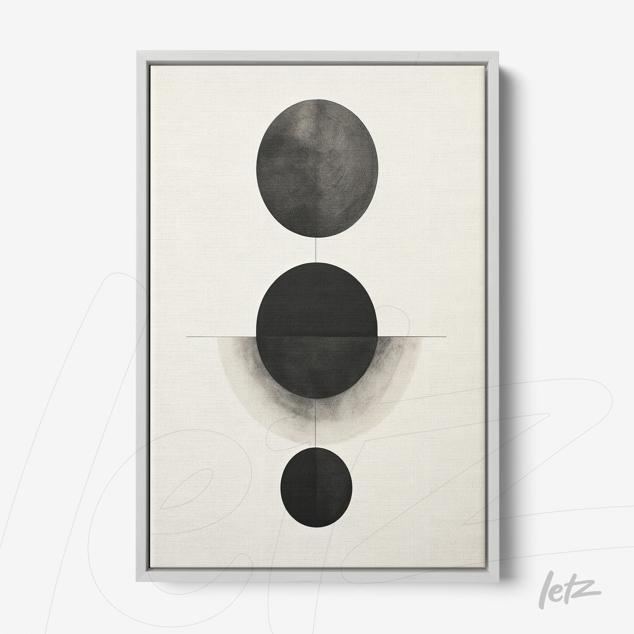 minimalist wall art featuring black circle composition on light background with silver frame