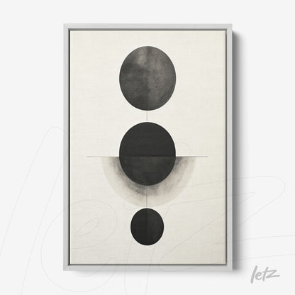 minimalist wall art featuring black circle composition on light background with silver frame