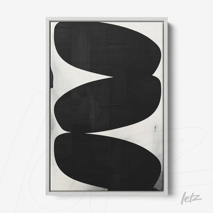 framed abstract art in black and white with light gray frame