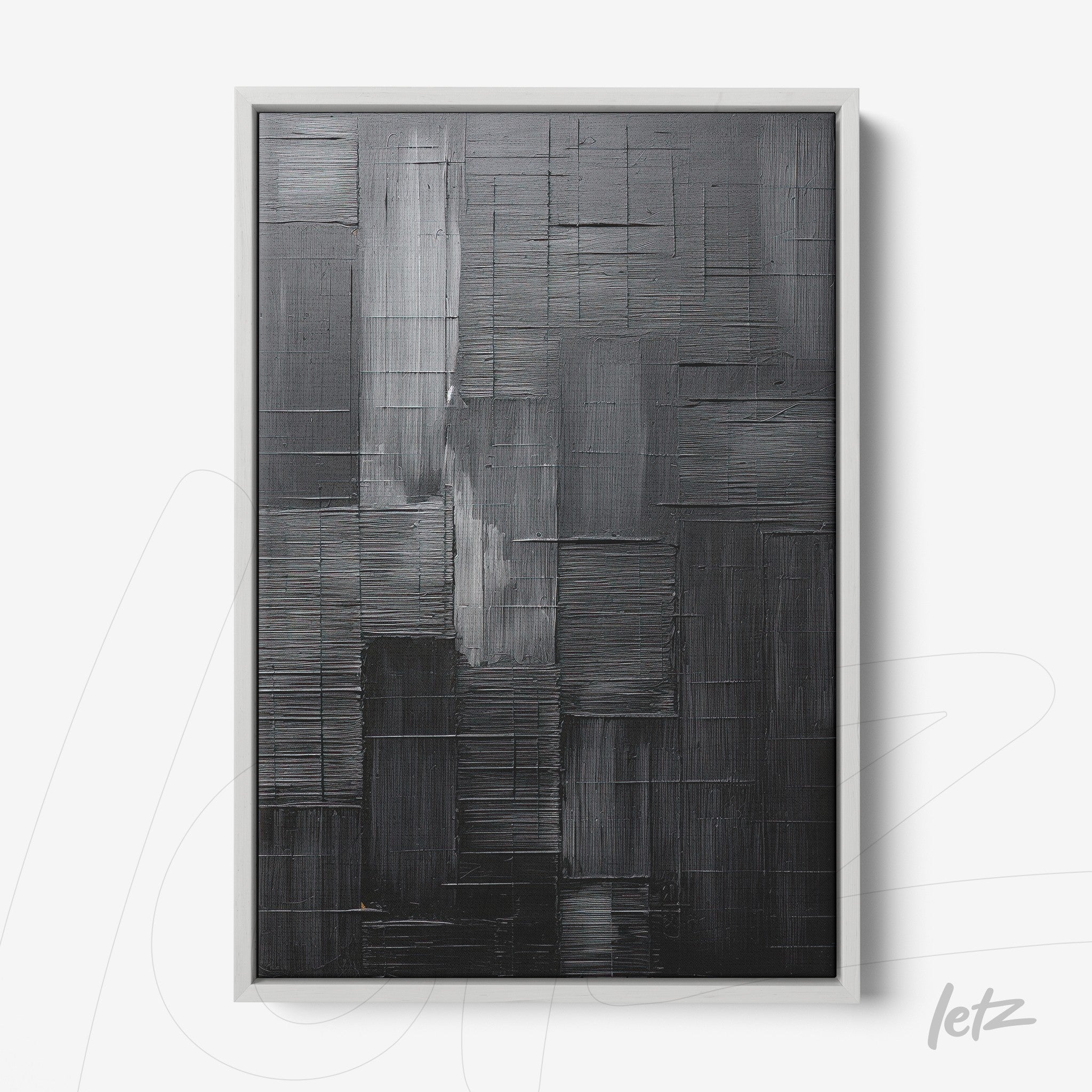abstract wall art in shades of black with linear texture on smooth background in white frame