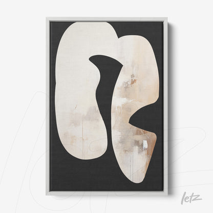 canvas art featuring abstract shapes in neutral tones against a black background, framed in white