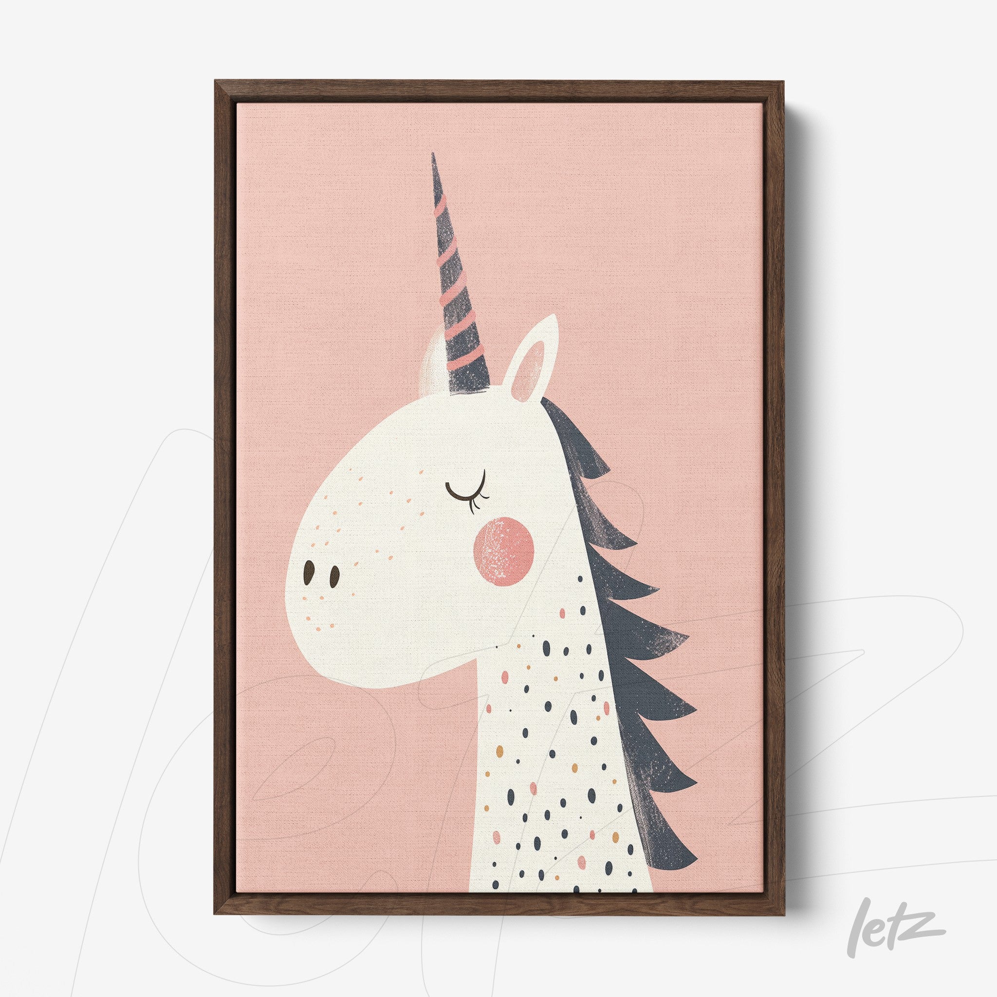 framed wall art featuring a unicorn illustration on a pink background with a dark wood frame