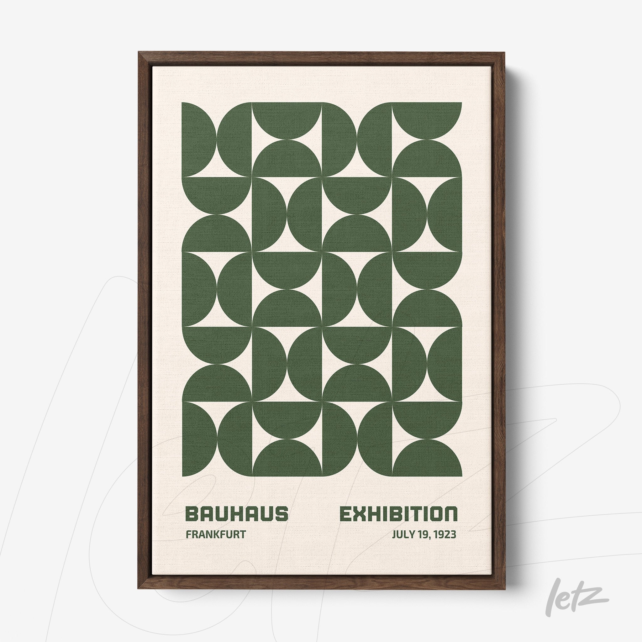 poster print featuring green geometric pattern and text 'bauhaus exhibition' in wooden frame