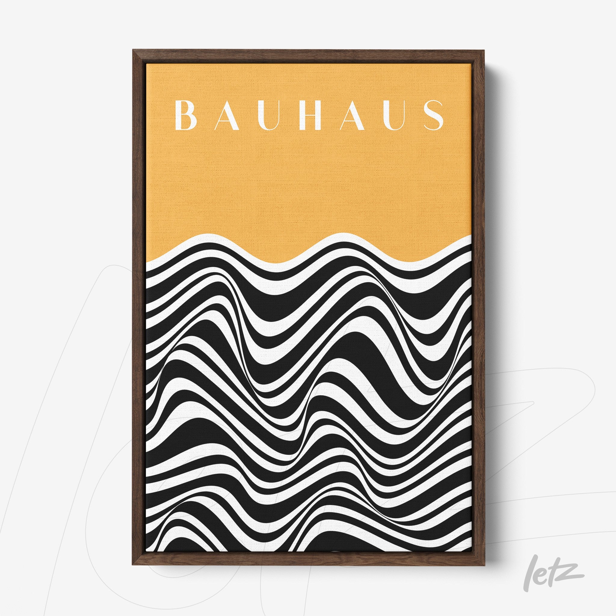 abstract wall art with wavy black and white design, yellow upper background and dark wood frame featuring the word bauhaus