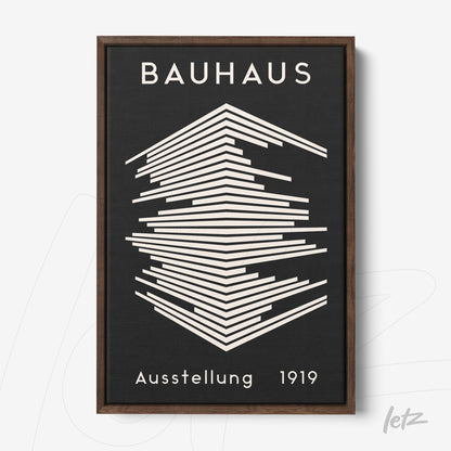 bauhaus style artwork with geometric black and white design, dark wood frame