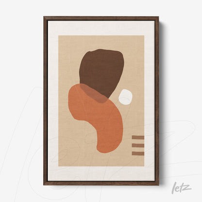 framed abstract art with earthy tones and organic shapes in dark wood frame
