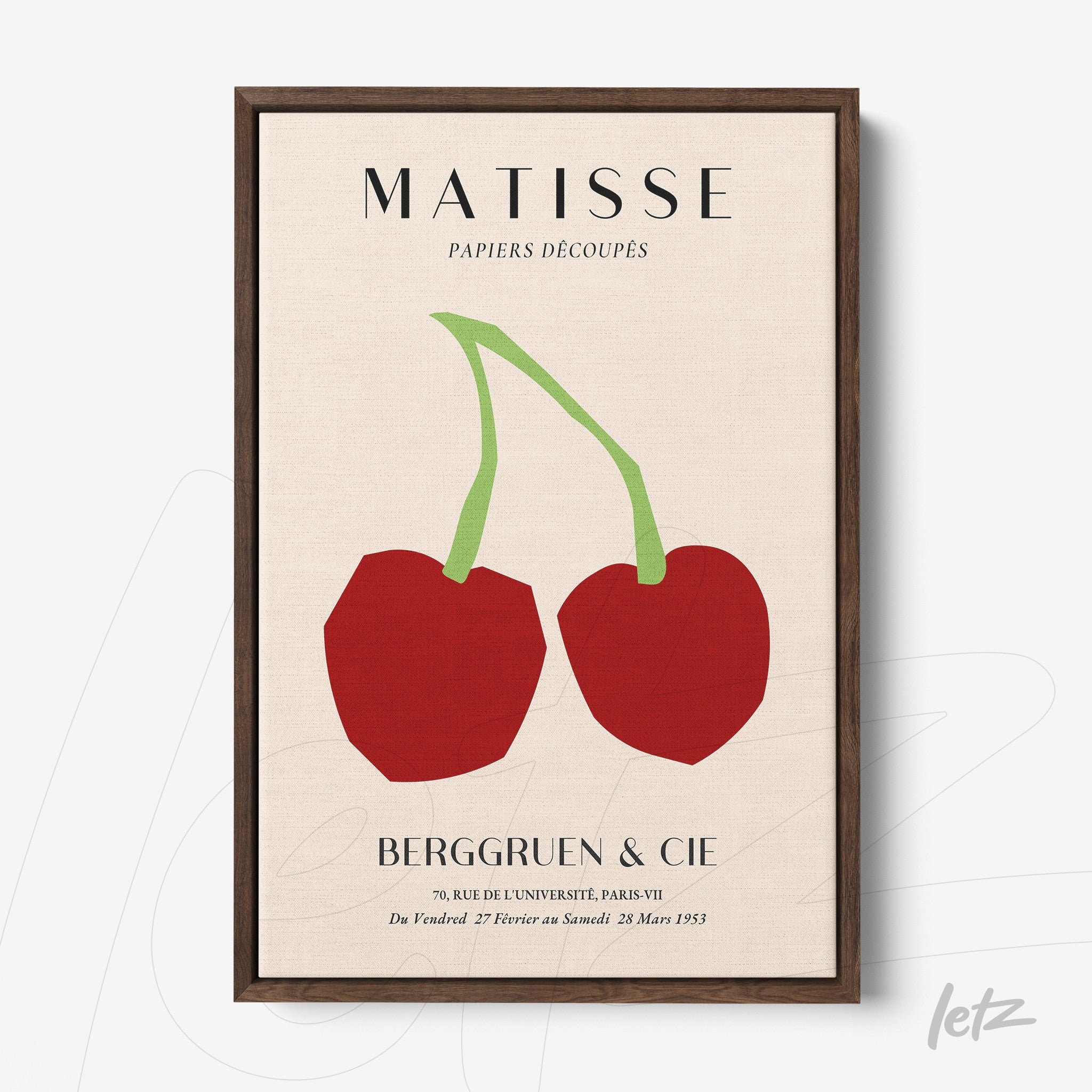 framed artwork of abstract cherries in cut paper style with dark wood frame