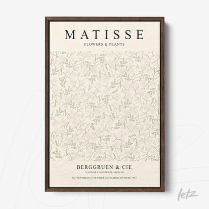 decorative wall art featuring flowers and plants in soft tones with dark brown frame