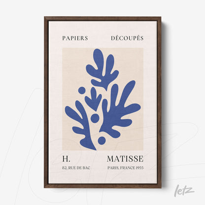 framed wall art featuring h. matisse design with organic blue shapes on light background and dark wooden frame