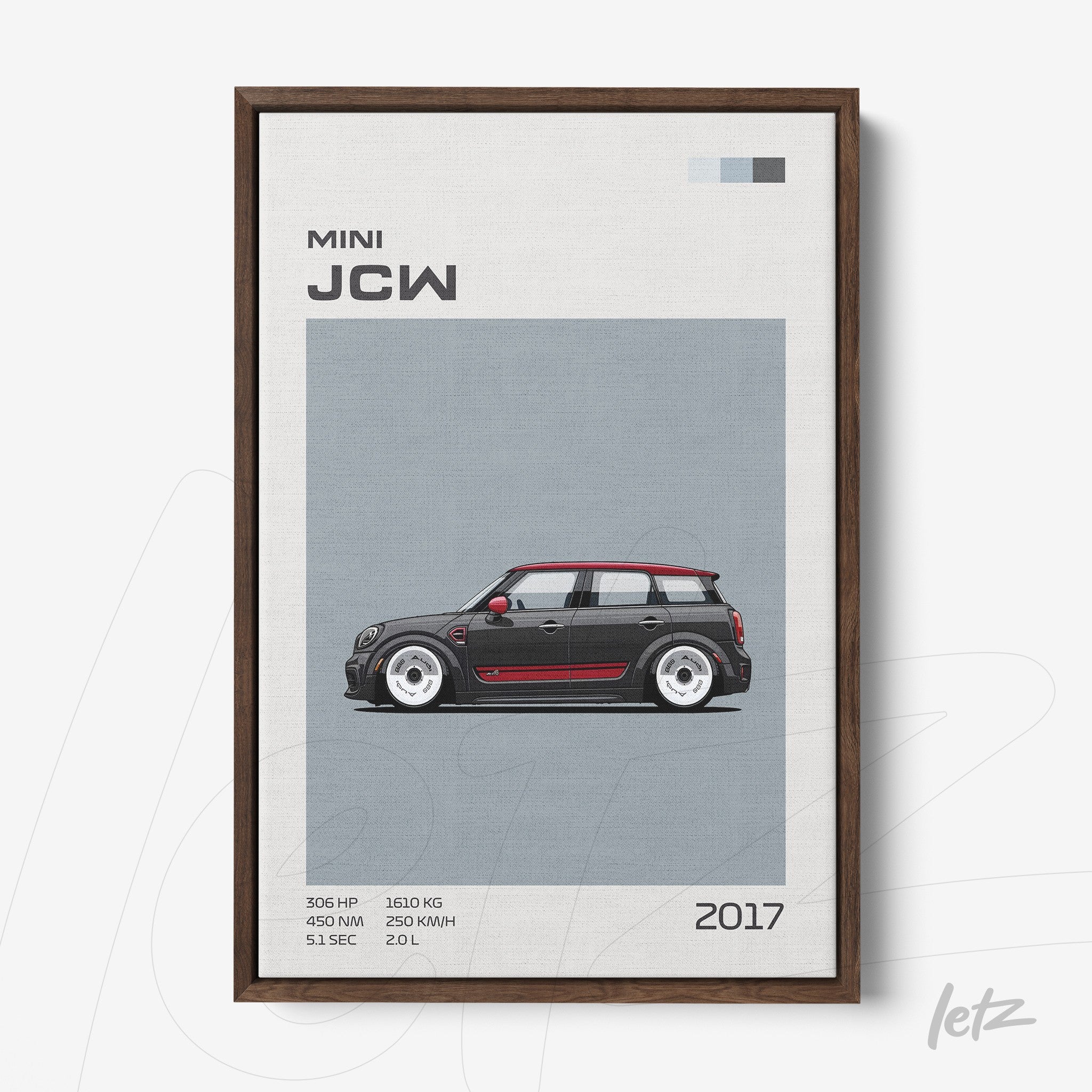 framed wall art featuring a digital illustration of a Mini JCW car with a dark wooden frame, gray background, and red accents