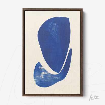 abstract art piece featuring blue shapes on light background in dark wood frame