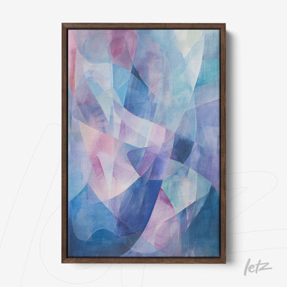 framed abstract artwork in shades of blue and pink with dark wood frame