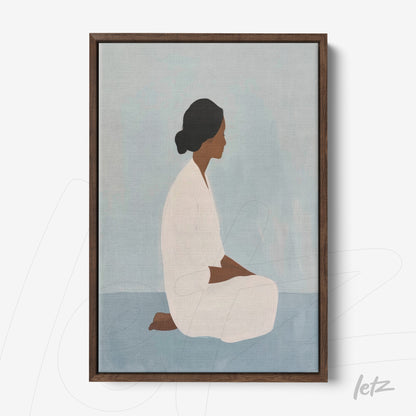 framed artwork featuring a minimalist illustration of a seated woman in neutral tones with dark wooden frame
